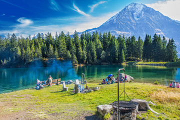Grill park near Arnisee lake in Swiss Alps. Arnisee is a reservoir in the Canton of Uri,...