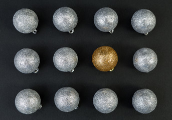Out of pattern concept with silver and golden balls