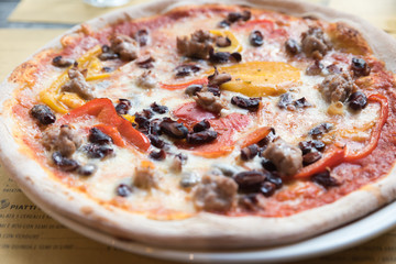 Neapolitan pizza sausage with peppers and mushrooms