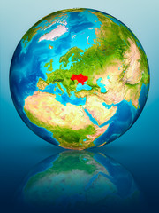 Ukraine on Earth on reflective surface
