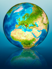 Serbia on Earth on reflective surface