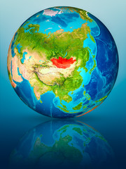 Mongolia on Earth on reflective surface