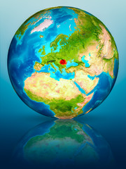 Romania on Earth on reflective surface