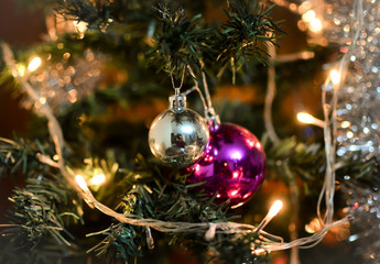 Christmas Decoration,  Red and Silver Christmas balls on tree with lights 