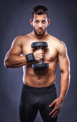 Fototapeta na wymiar fitness man with sports dumbbells