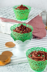 St. Patricks Day chocolate cupcakes with green sugar sprinkles