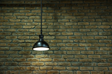 light decoration on a brick wall background