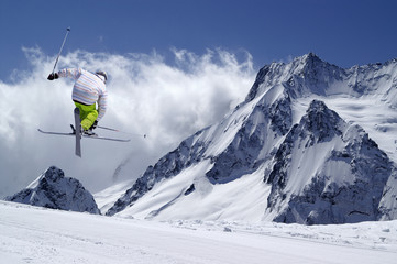 Freestyle ski jumper with crossed skis