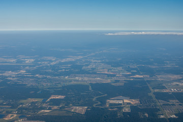 Metropolis Area of Houston, Texas Suburbs from Above in an Airplane