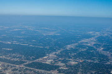 Metropolis Area of Houston, Texas Suburbs from Above in an Airplane