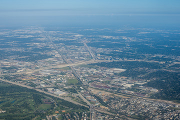 Metropolis Area of Houston, Texas Suburbs from Above in an Airplane