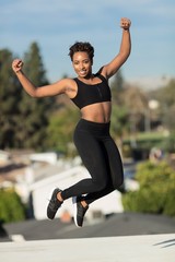 Woman posing in workout outfit