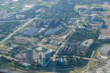 Metropolis Area of Houston, Texas Suburbs from Above in an Airplane