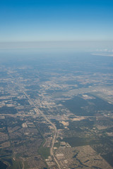 Metropolis Area of Houston, Texas Suburbs from Above in an Airplane