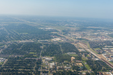 Metropolis Area of Houston, Texas Suburbs from Above in an Airplane