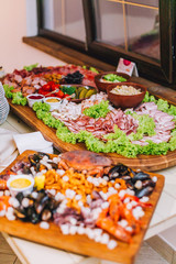 Close up shot of a wedding meat buffet table. Shallow focus