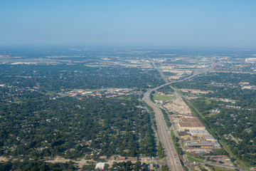 Metropolis Area of Houston, Texas Suburbs from Above in an Airplane