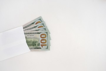 money in a gift envelope on a white background