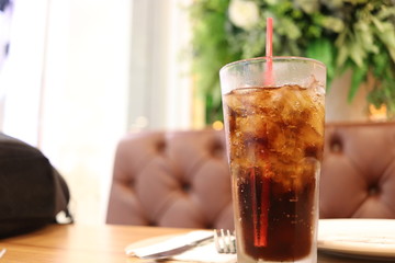 Iced cola, carbonated soft drink.