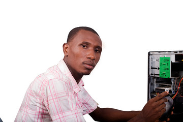 young technician repairing a computer