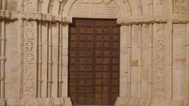 15380_The_brown_big_door_of_the_church_in_Ancona_Italy.mov