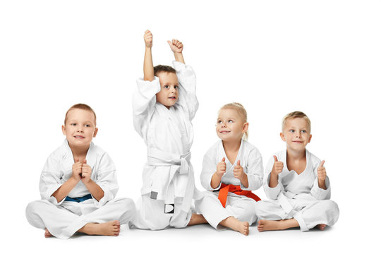 Little children in karategi on white background