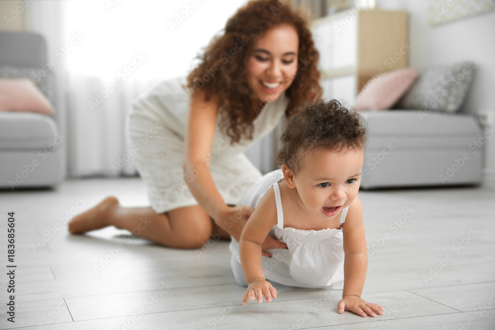 Canvas Prints cute baby and young mother at home