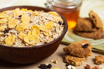 Bowl of Oats and Cereal with Cookies on the Side