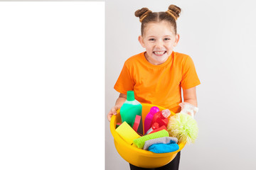 a little pretty girl doing housework