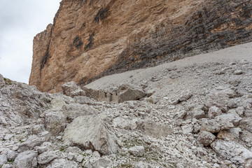 Italian army first world war post ruines at the foot of vertical dolomitic wall, Fontananegra Pass, theater of fierce fighting in 1915 - 16, Tofane, Dolomites, Italy