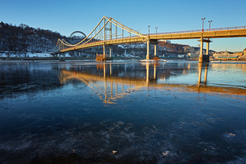 Frosty morning at the river near the bridge. Kiev