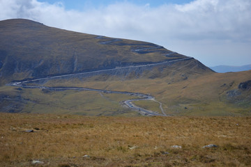 Alpine mountain road photographed from high altitude