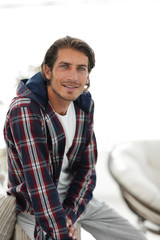 Fototapeta premium portrait of a successful guy in a checked shirt.