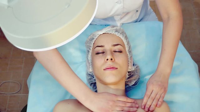 Skin Rejuvenation Treatment massage with body cream, 4k footage.