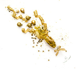 Champagne glasses with confetti. Flat lay, top view celebrate party concept. New Year Gold Composition