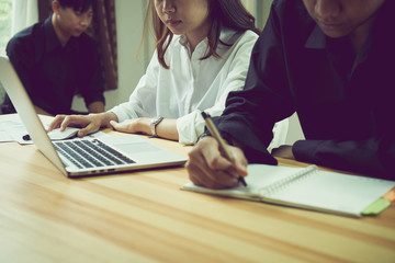 teamwork, Young businesswoman in office in casual shirt. Selecting information with colleagues with a computer. Business Marketing Planning.
