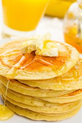 Stack of Pancakes with Maple Syrup