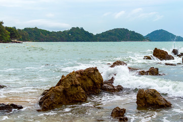 Fototapeta na wymiar Wave and the rock. Beautiful seascape