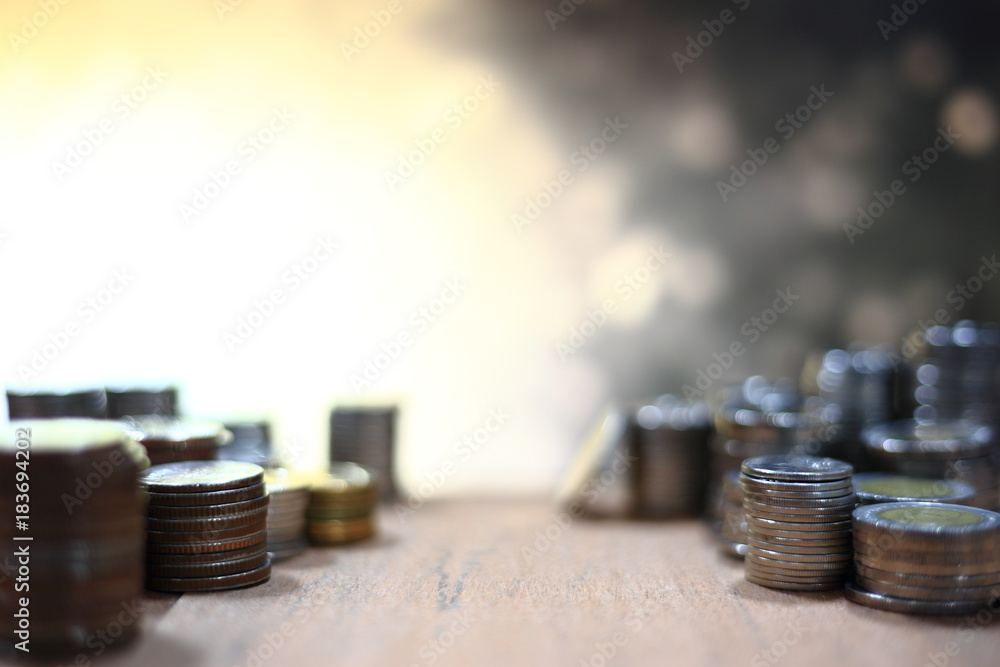 Poster two coin heap stacked multi-color blurred glitter circular vintage light bokeh in the background