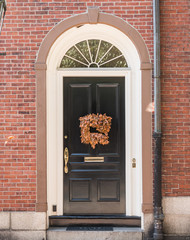 Black Door with Fall Wreath