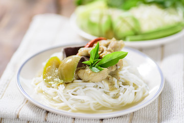 Thai food, rice vermicelli noodles with green curry chicken