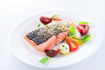 Salmon steak and salad