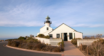 OLD POINT LOMA LIGHTHOUSE AT CABRILLO NATIONAL MONUMENT UNDER BLUE CIRRUS CLOUDS AT POINT LOMA SAN DIEGO CALIFORNIA UNITED STATES
