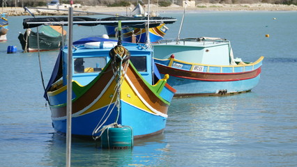 Fototapeta na wymiar colorful fishing boats , Malta Valeta old harbour sea,