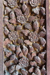 Ancient wooden carved door in Thailand.