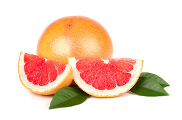 Pink grapefruit and slices isolated on white background with clipping path. Isolated grapefruits. Fresh grapefruit with green leaves isolated.