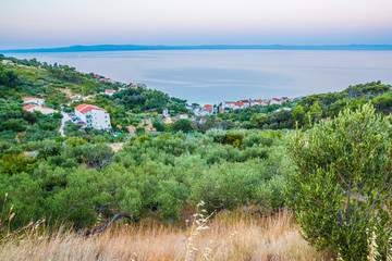 Fototapeta na wymiar Amazing colorful sunset on the Adriatic sea in Riviera Makarska, Croatia 