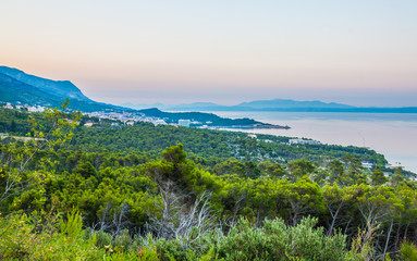 Amazing colorful sunset on the Adriatic sea in Riviera Makarska, Croatia 
