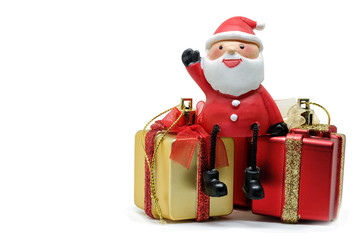 Santa Claus dolls and Christmas decorations box red and gold on white background with copy space