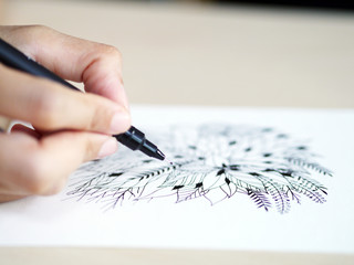 artist desk top view pen, pencil mandala flower floral hand drawing design illustration